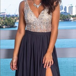 Full length. Never worn charcoal gray gown